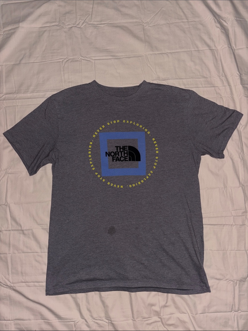 The North Face Men's Gray Short Sleeve Logo Tee with Blue & Yellow Accent